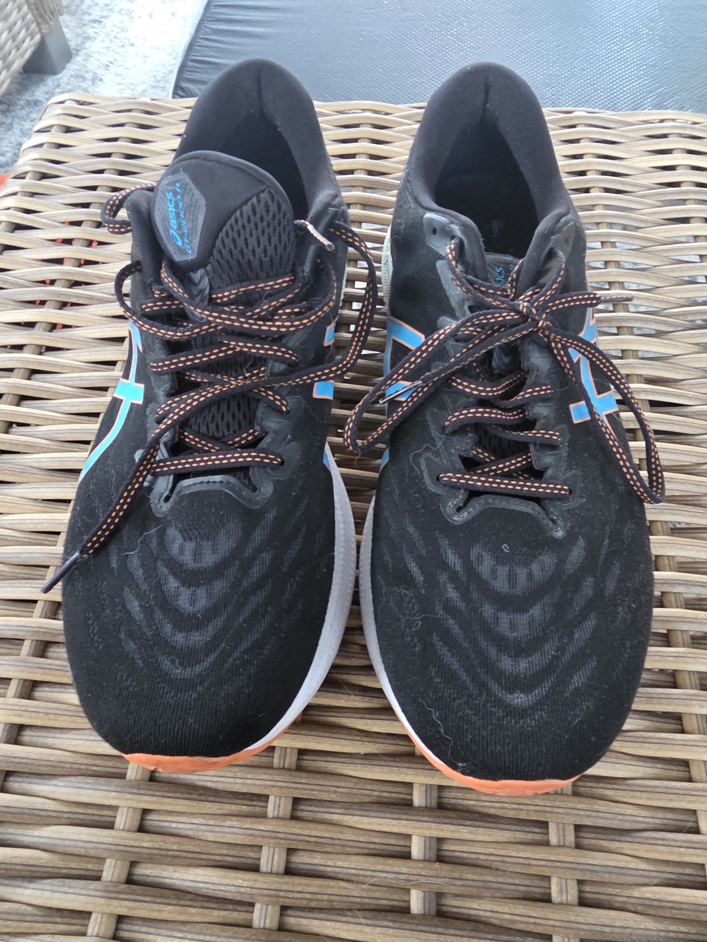 ASICS Men’s Black Running Shoes with Blue Accents